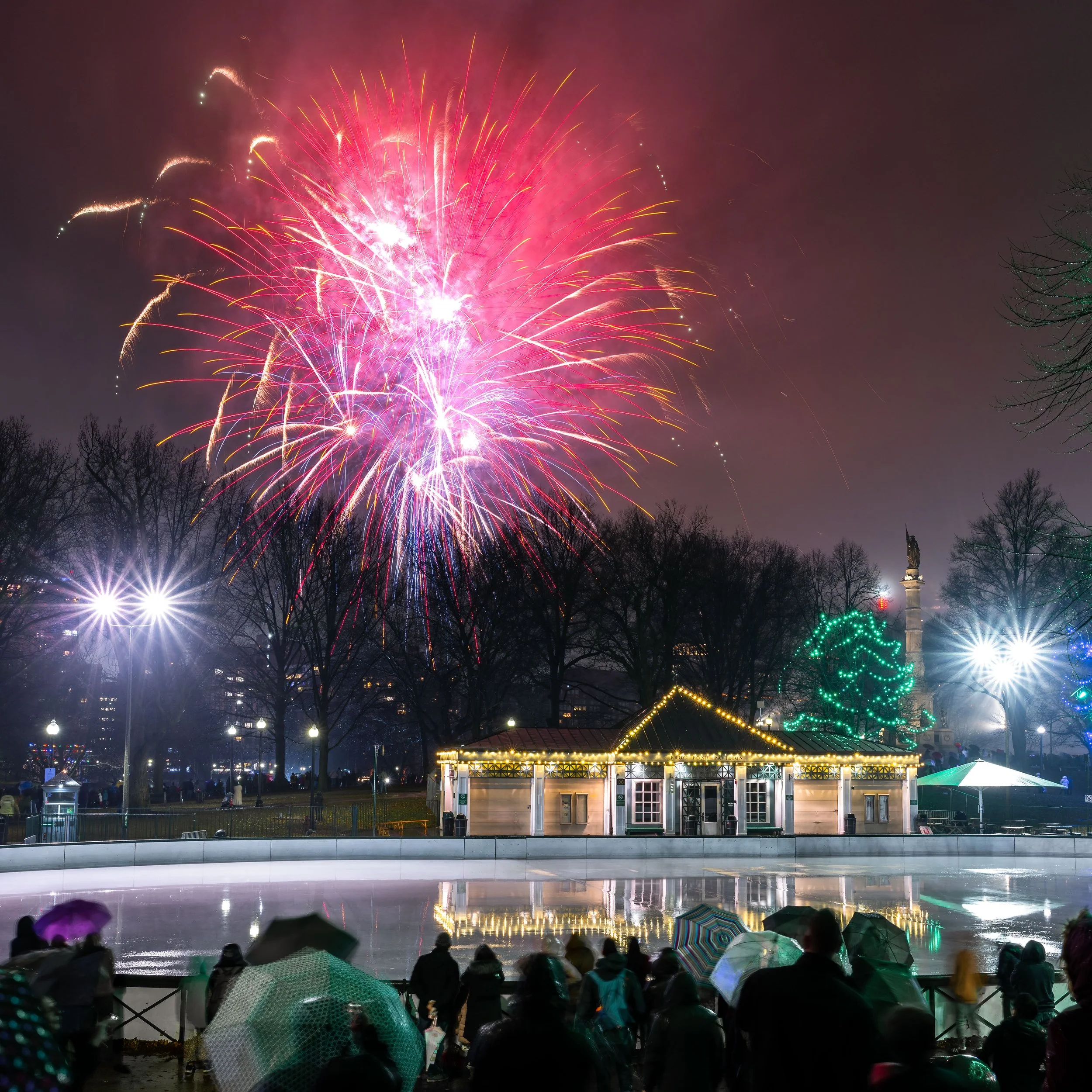 Fireworks light up the sky over Boston Common and Frog Pond during New Year's Eve celebrations