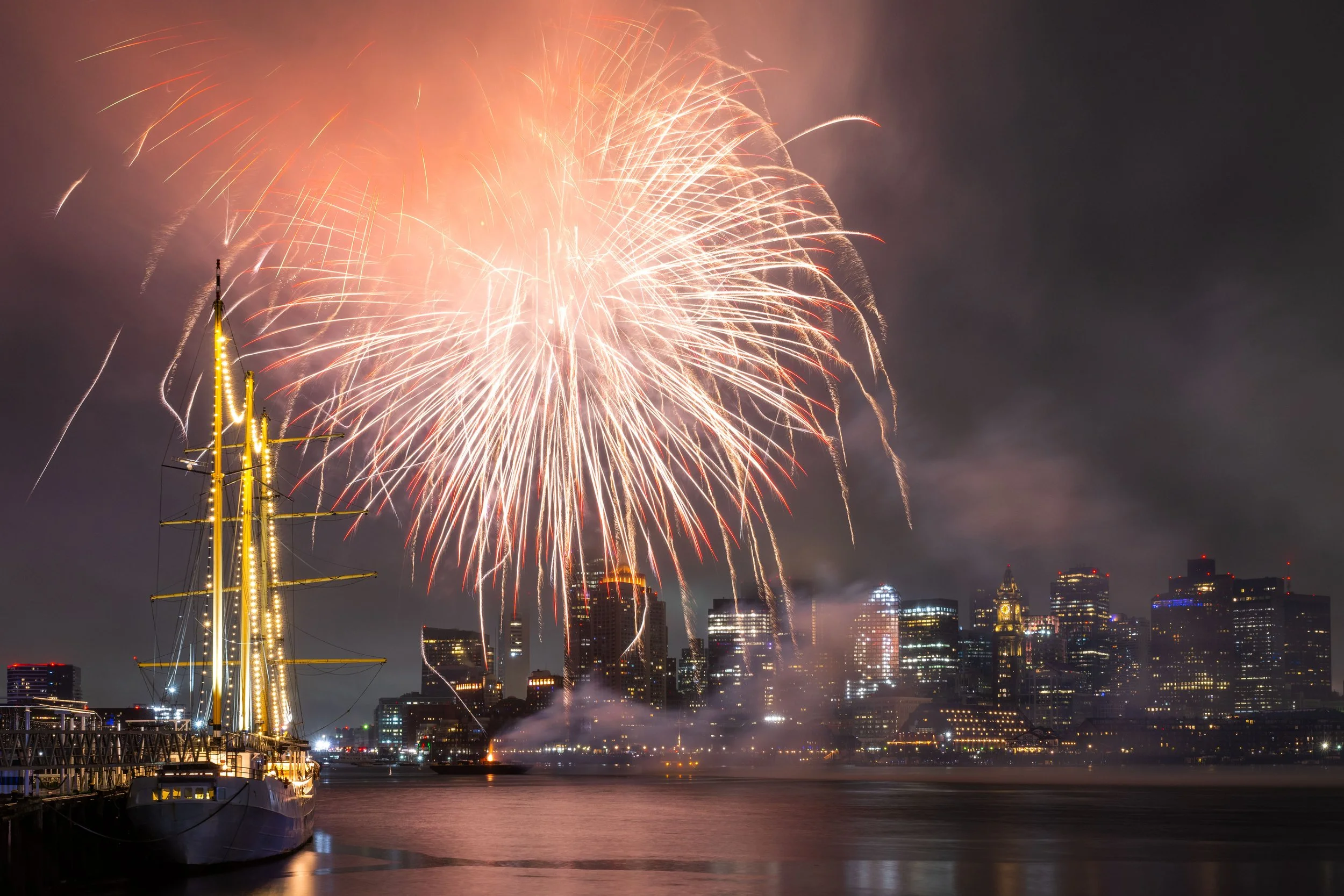 Fireworks light up the sky over Boston Harbor during New Year's Eve celebrations