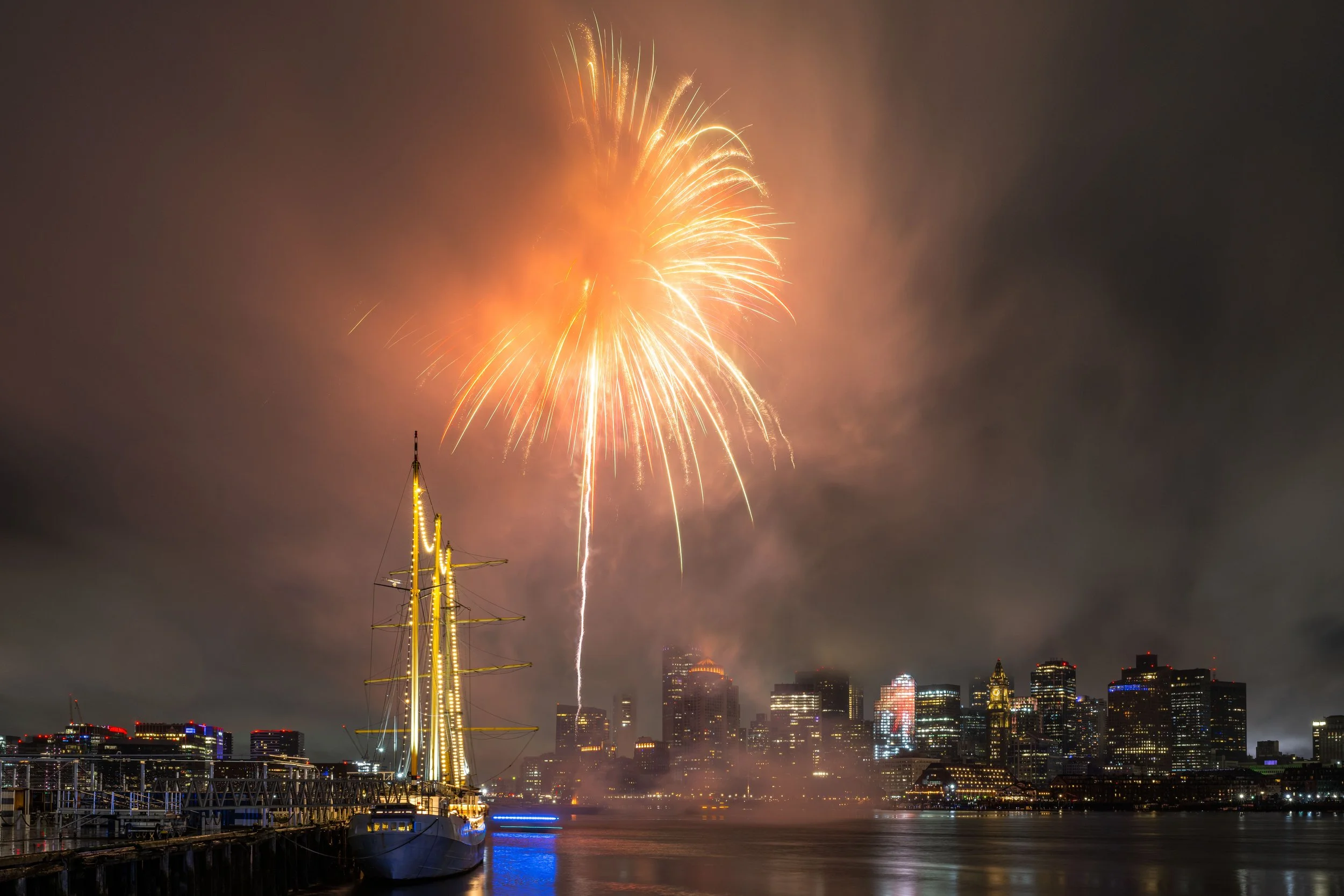 Fireworks light up the sky over Boston Harbor during New Year's Eve celebrations