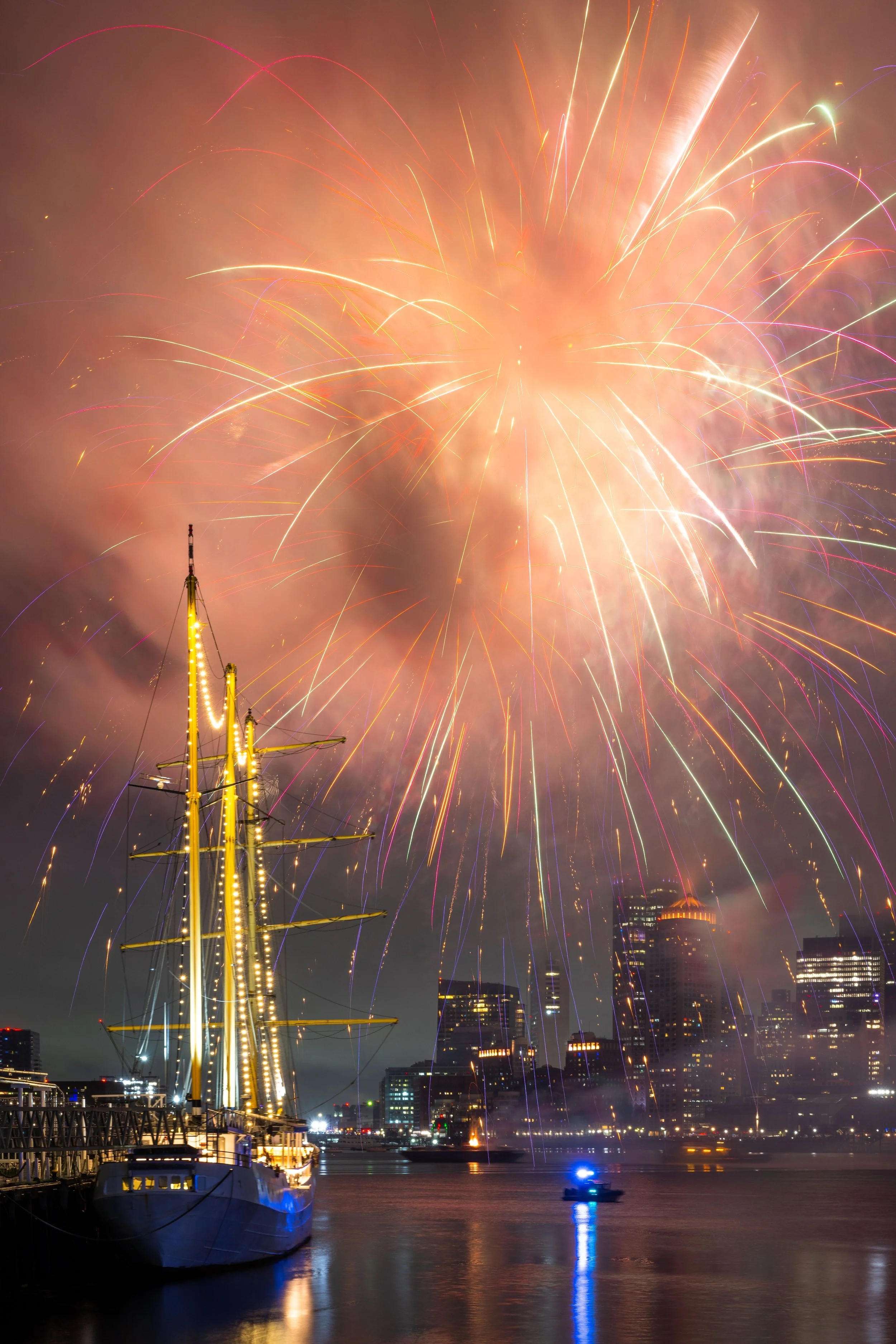 Fireworks light up the sky over Boston Harbor during New Year's Eve celebrations