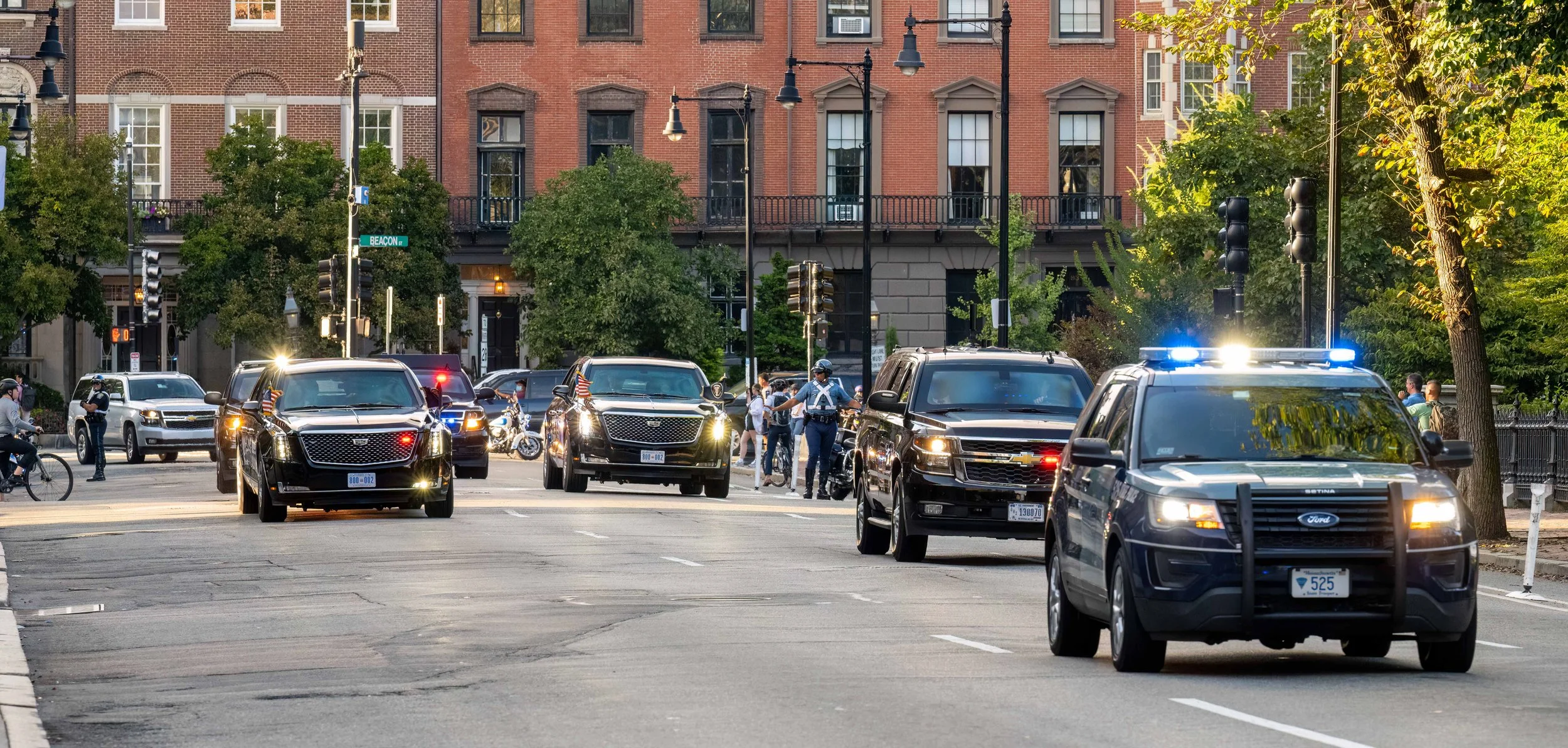 President Biden's motorcade drives down Arlington Street in downtown Boston
